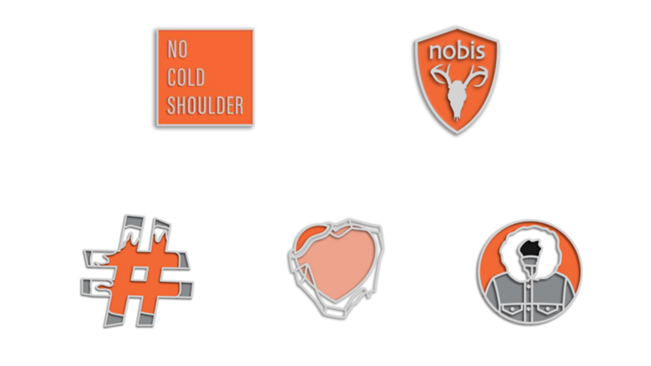 Orange and silver enamel pins in different designs