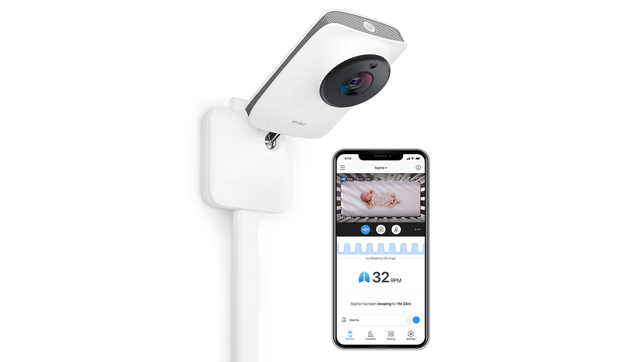 White wall-mounted baby camera with app