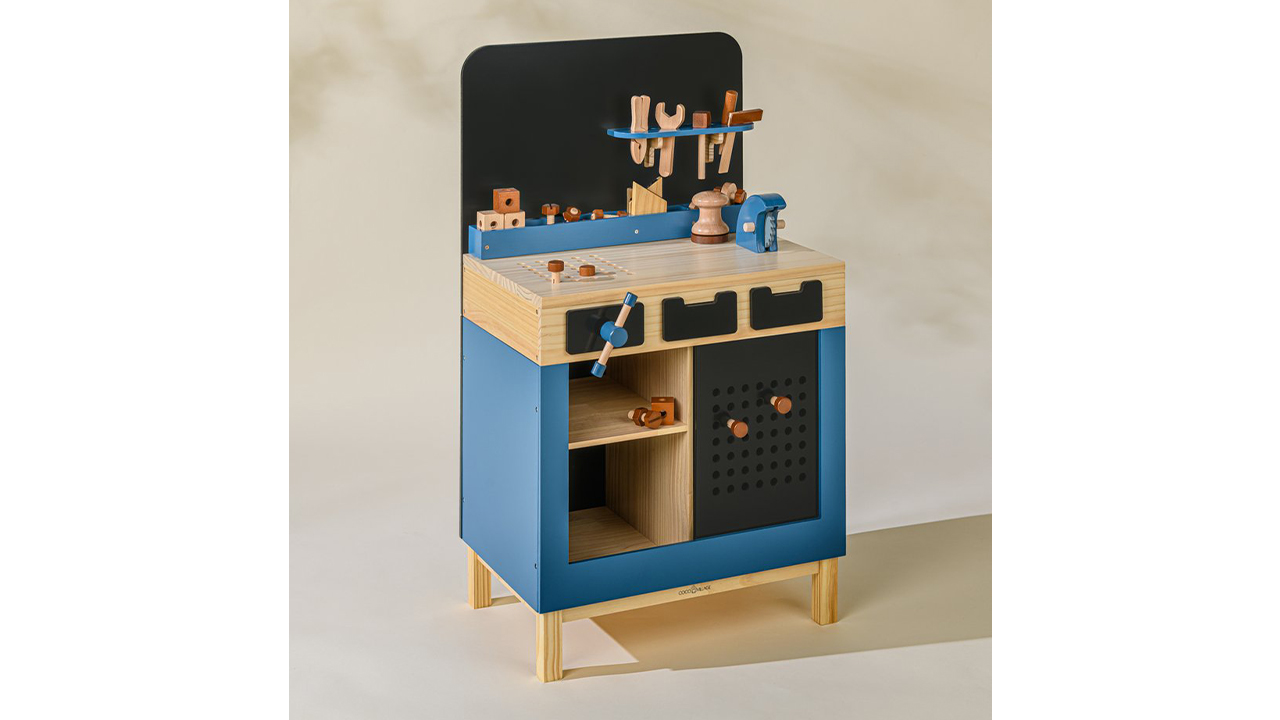 Blue wooden workbench with wooden tools and accessories