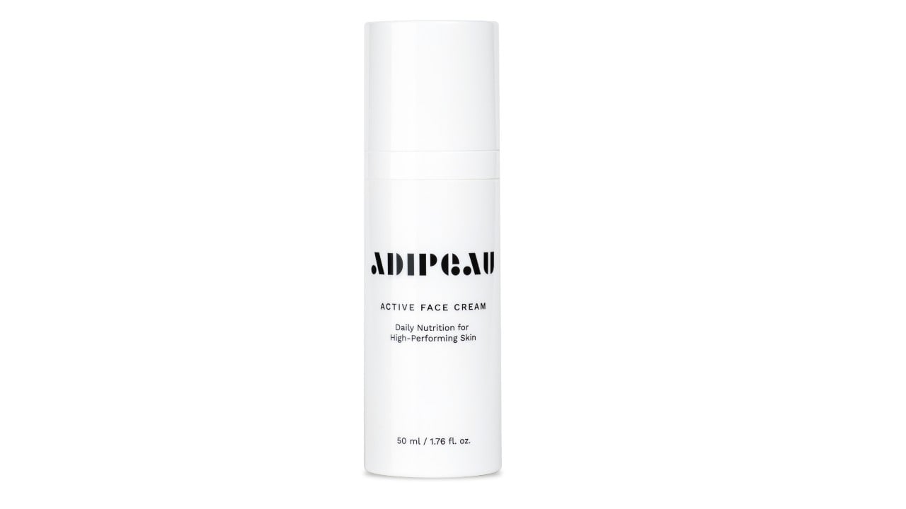 white bottle of active face cream