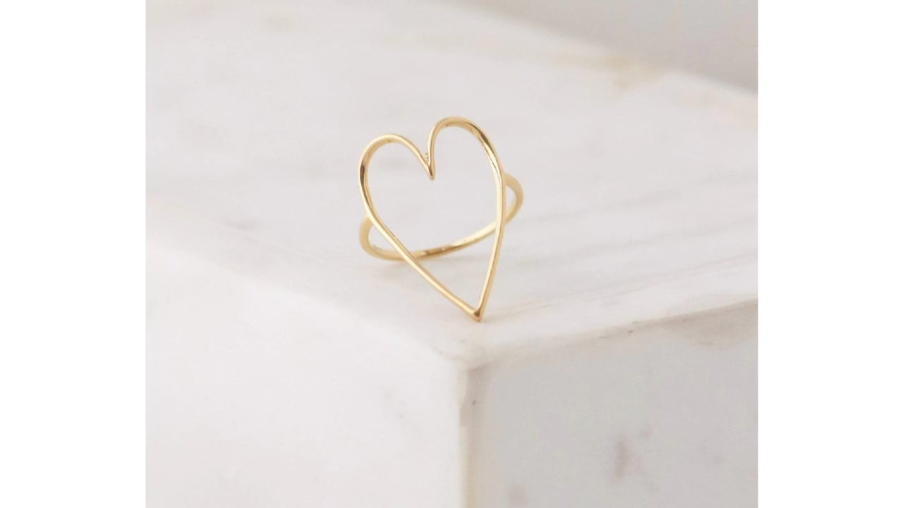gold-plated brass ring in the shape of a heart