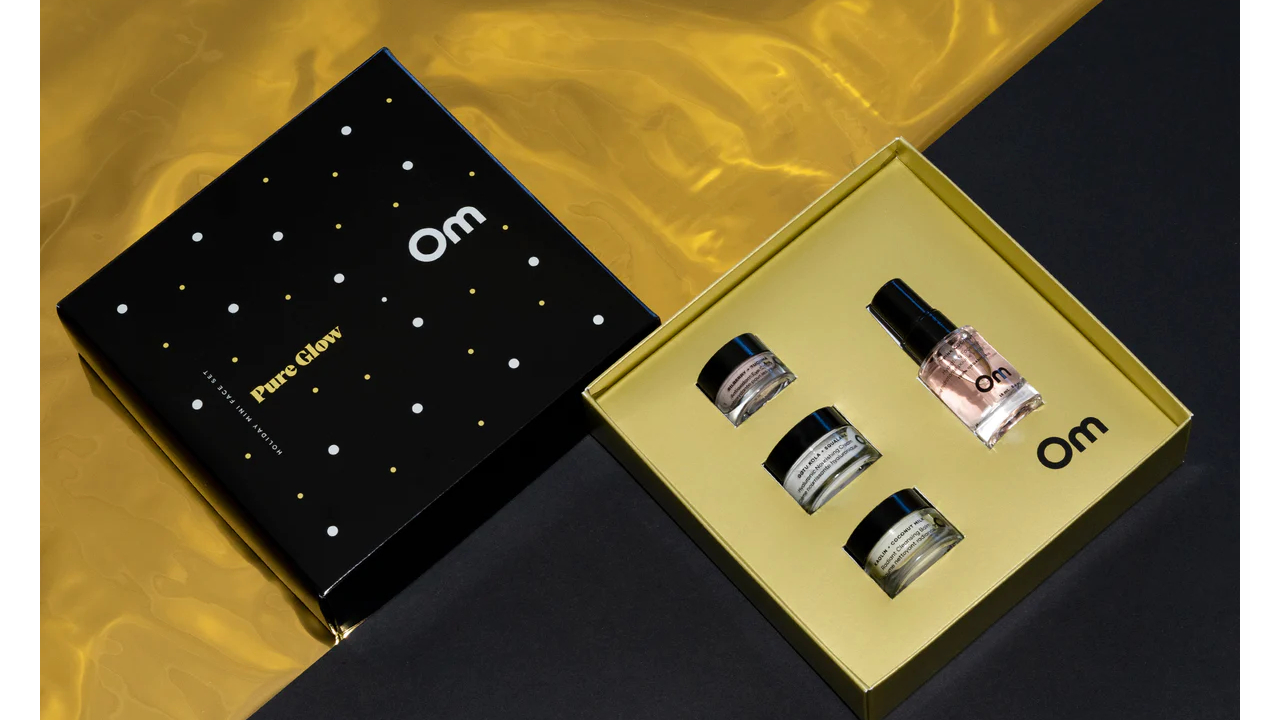 Black and gold gift set featuring four mini face products