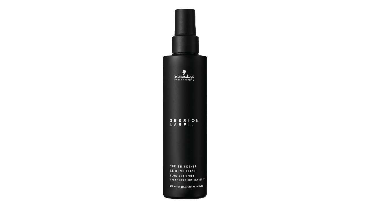 black bottle of hair product