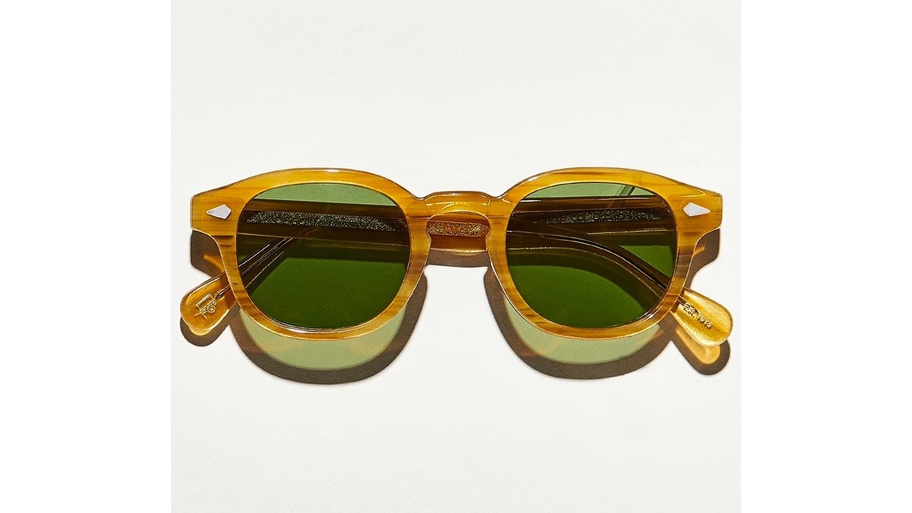 brown sunglasses with green tinted lenses