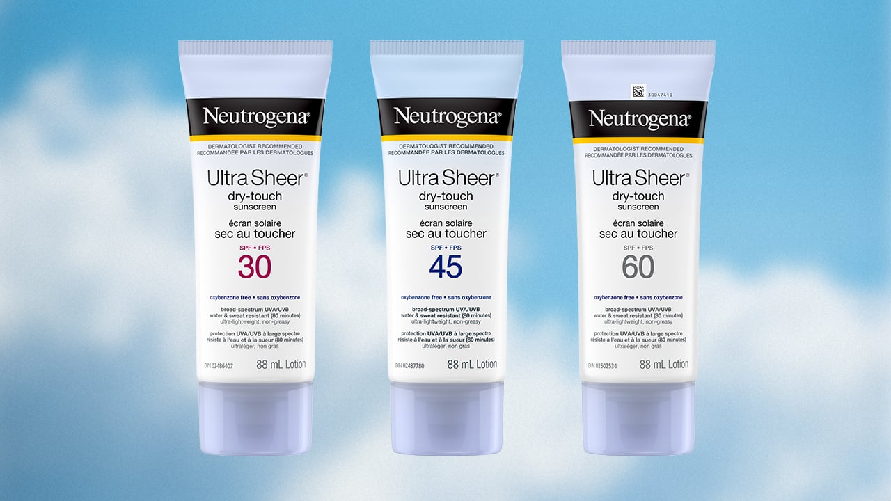 Three bottles of Neutrogena Ultra Sheer Dry-Touch sunscreen float on a blue sky with clouds