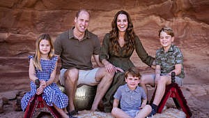 prince william, kate middleton, prince george, princess charlotte and prince louis pose in a cave in Jordan