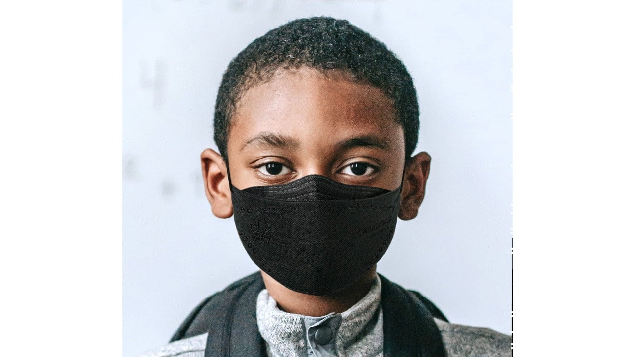 Boy wearing a CA-N95 mask
