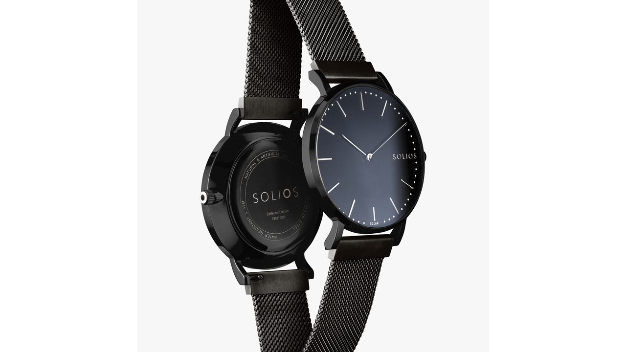 Black solar-powered watch with black mesh strap