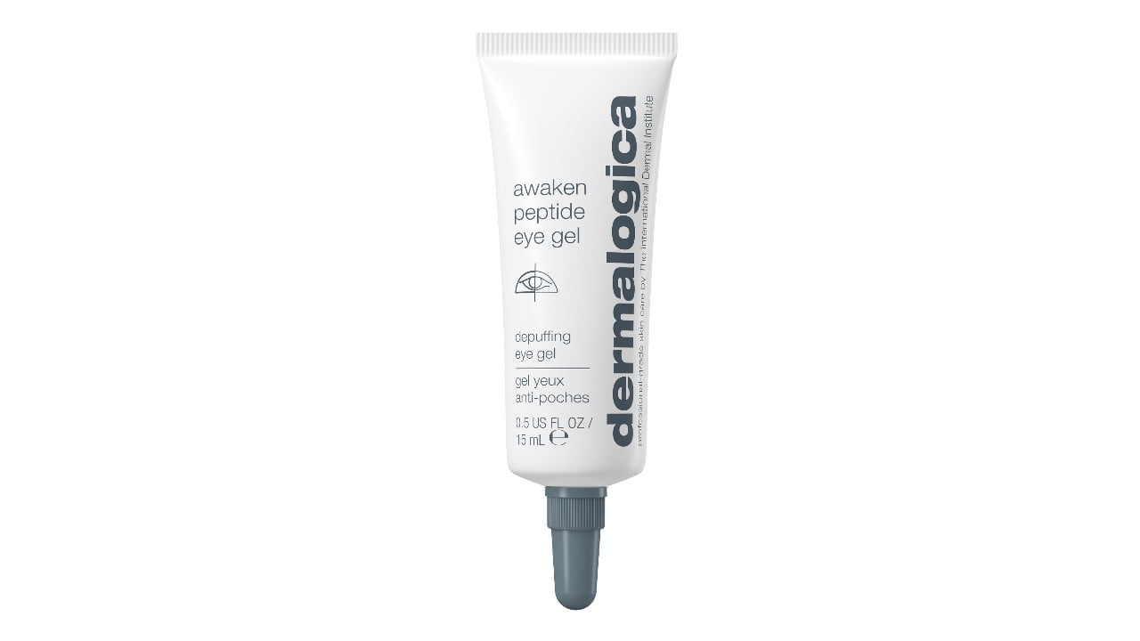 A small grey and white tube of eye cream.