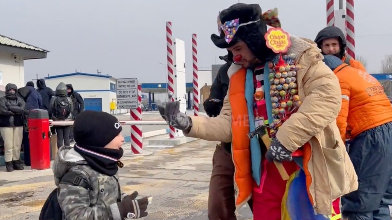 A group of clowns are cheering up Ukrainian kids as they arrive in Moldova