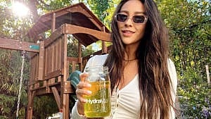 Actress Shay Mitchell drinking Hydralyte as a pregnancy hack