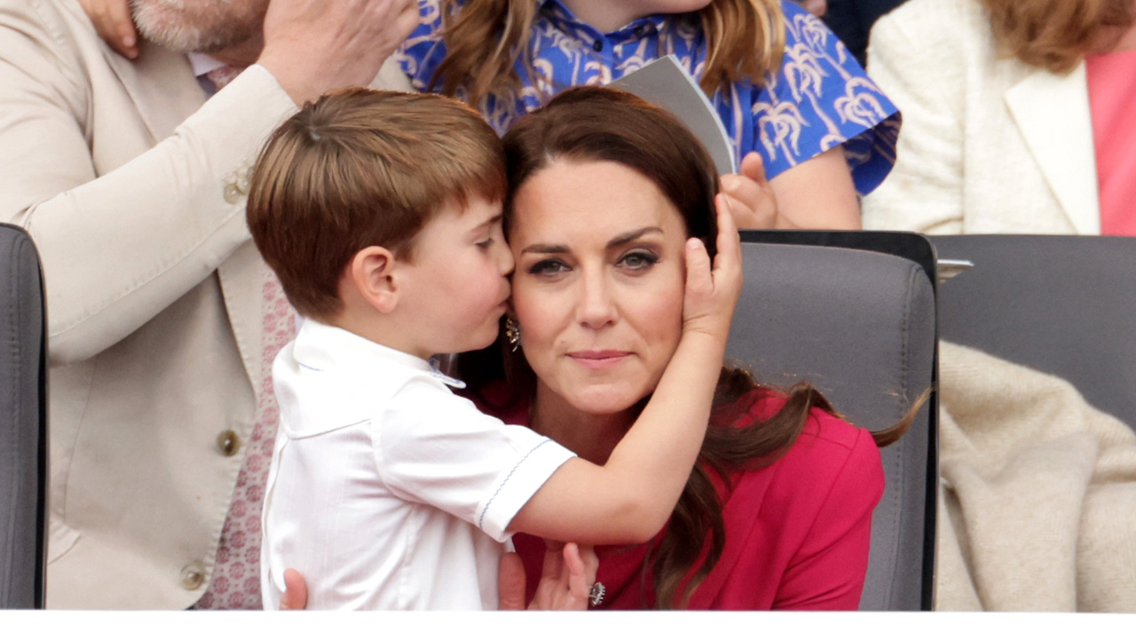 Prince Louis kisses Kate MIddleton on the head at the platinum jubilee pageant