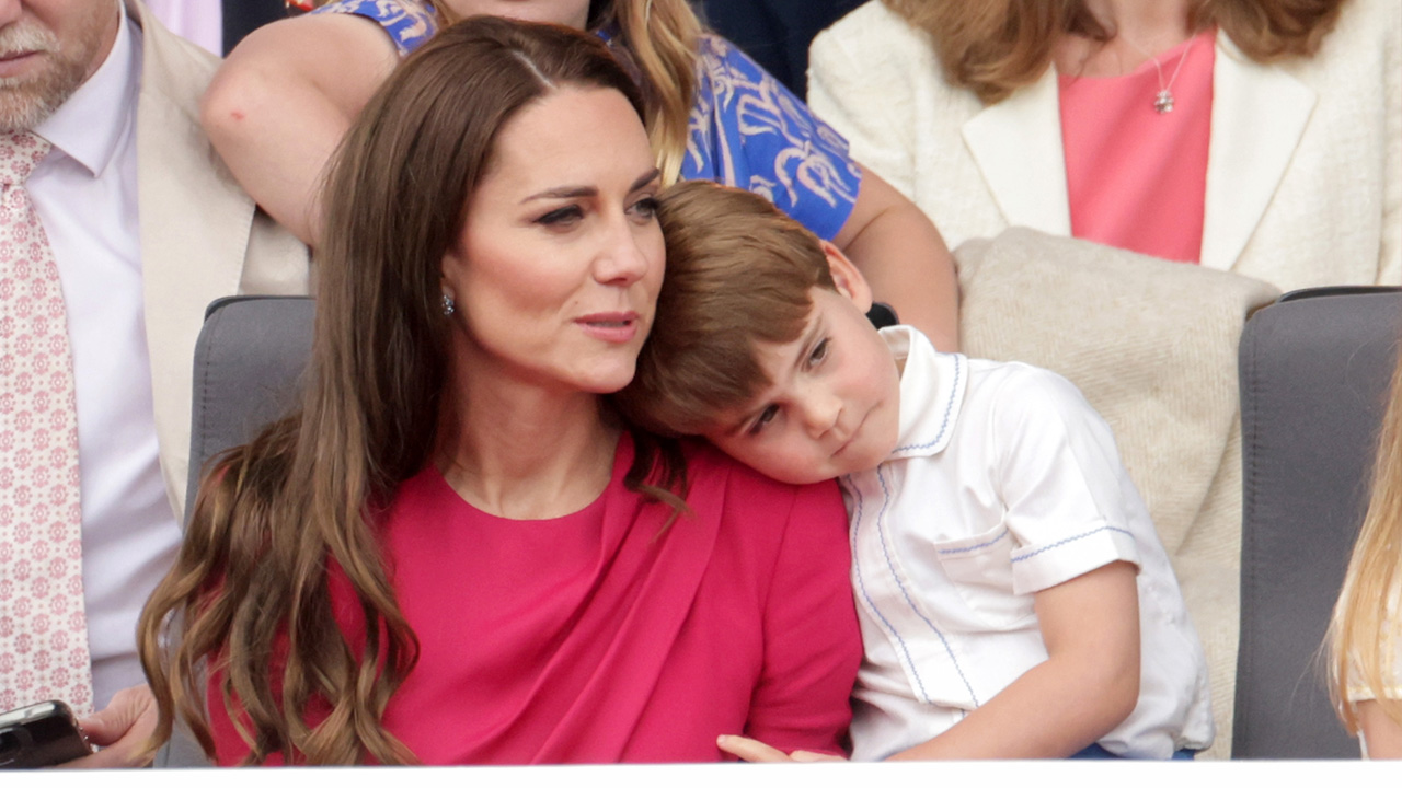 Prince Louis hugs his mother during the platinum jubilee pageant
