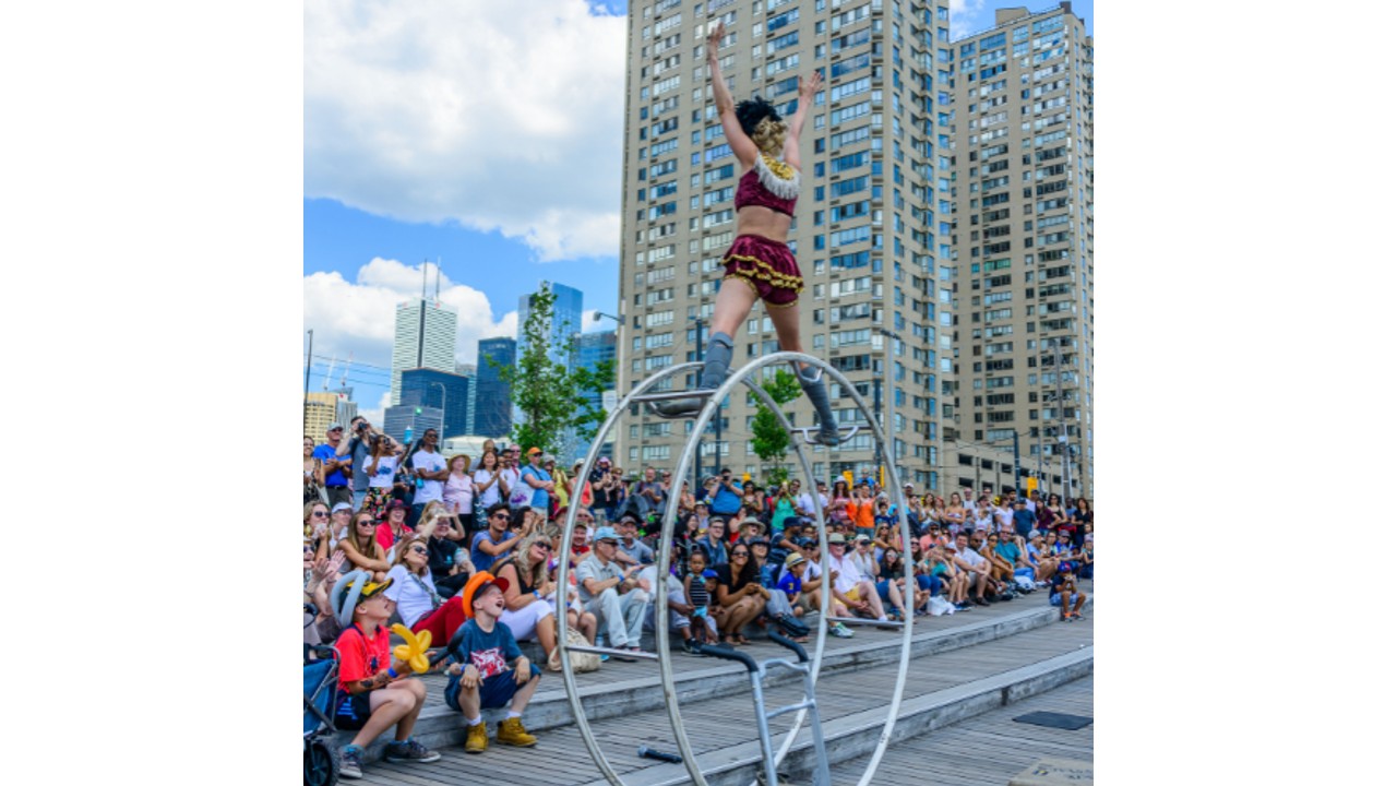 Audience watching a performance at the Redpath Waterfront Festival 