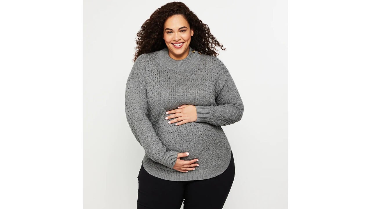 Pregnant woman wearing grey knitted sweater from Motherhood