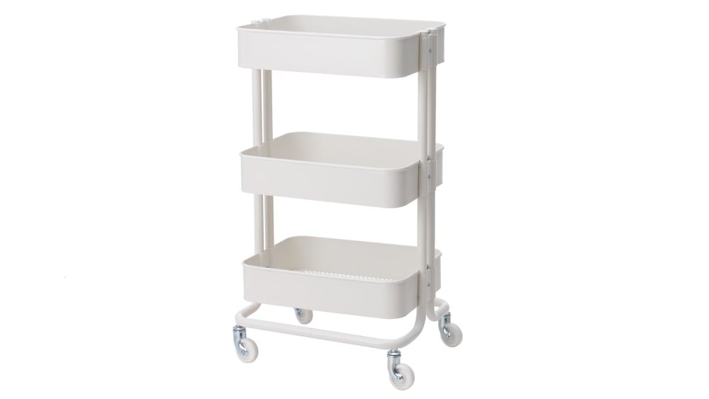 A white IKEA rolling cart with three tiers.