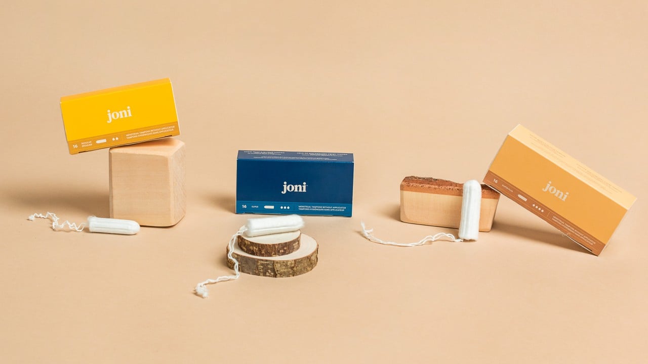 vignette of tampons and boxes on pieces of wood