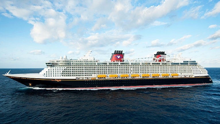 The Disney Dream cruise ship sails on the open sea.