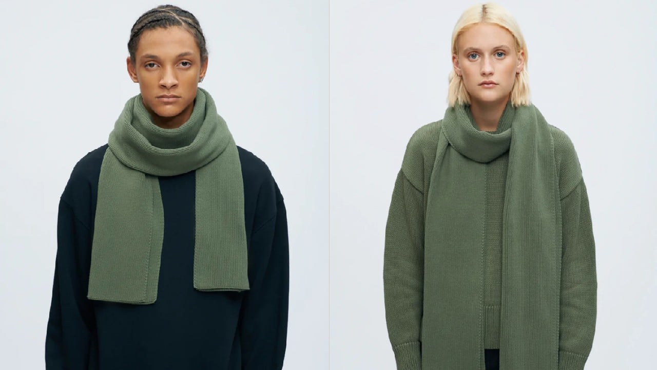 two models wearing sage green scarf 