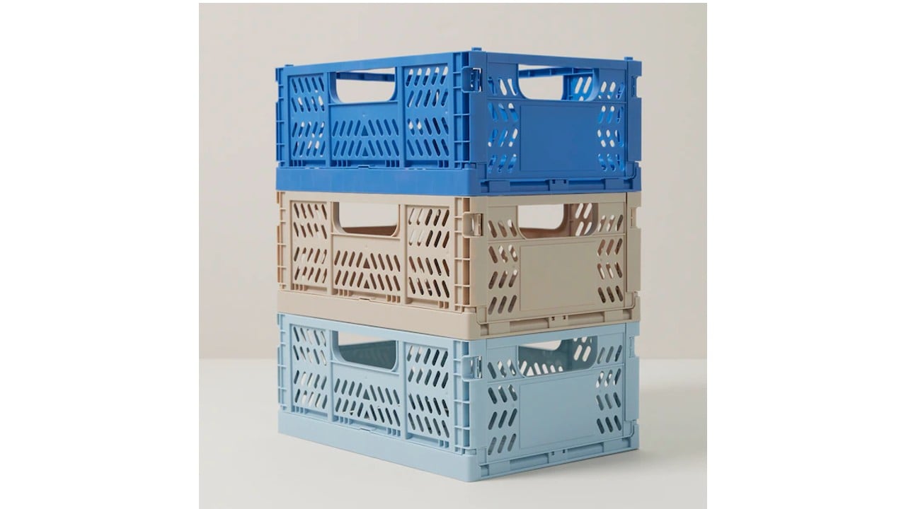 blue, beige and baby blue plastic bins stacked
