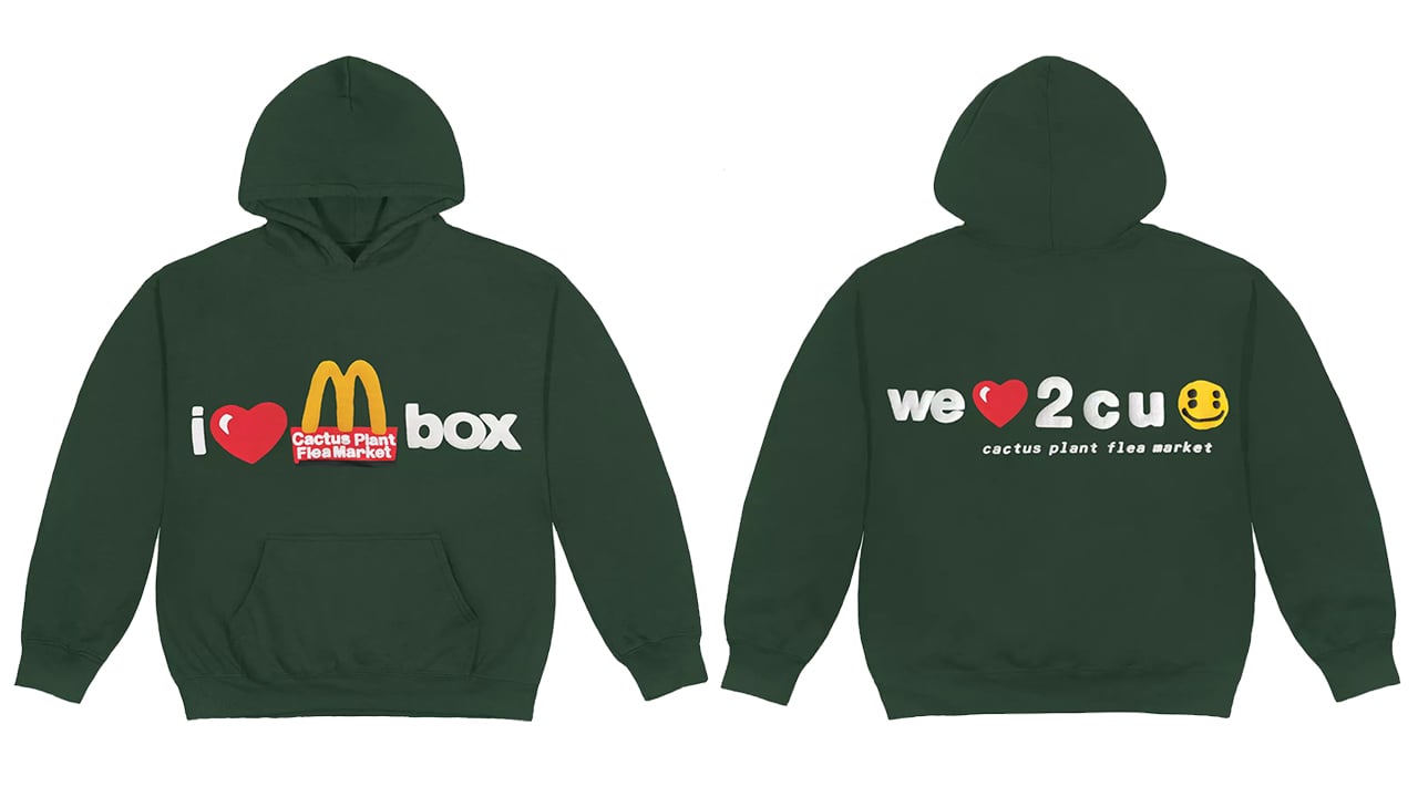 A dark green hoodie with the words "I heart McDonald's Cactus Plant Flea Market box" in the front and "We heart 2 c u" at the back. 