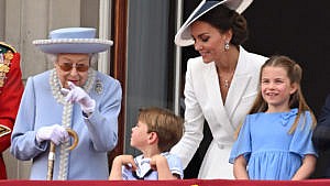 The Queen, Prince Louis, the Duchess of Cambridge and Princess Charlotte on the balcony during Trooping the Colour in 2022.