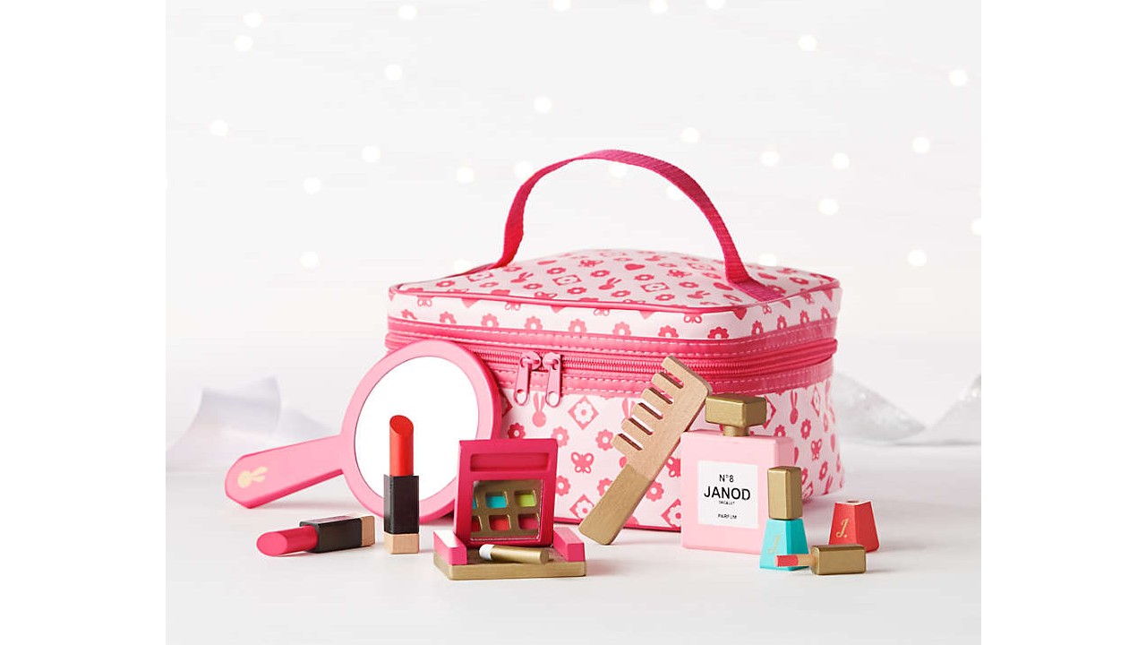 pink makeup bag with toy makeup