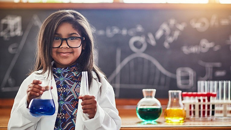Cropped shot of a cute little girl in a science lab