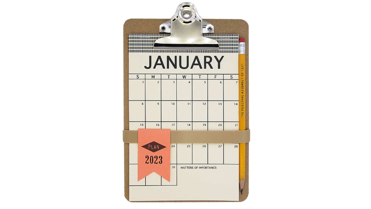 mini 2023 calendar on a clipboard