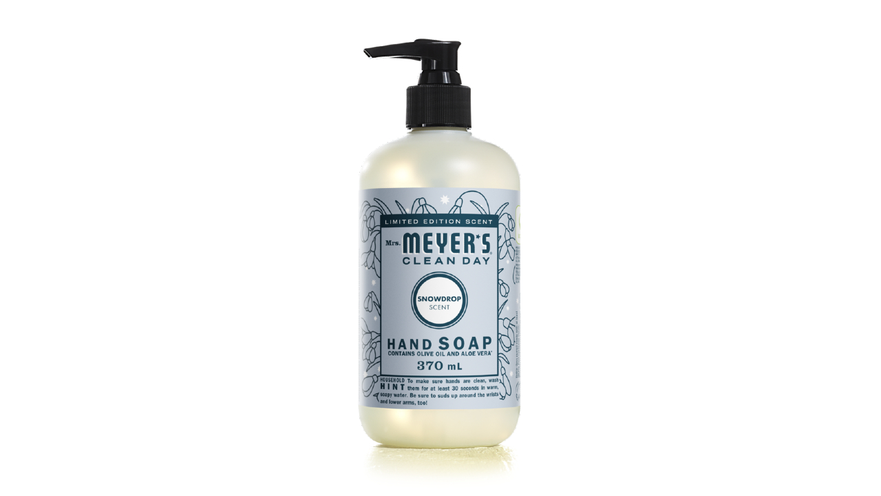 Clear soap bottle with black pump and festive blue label