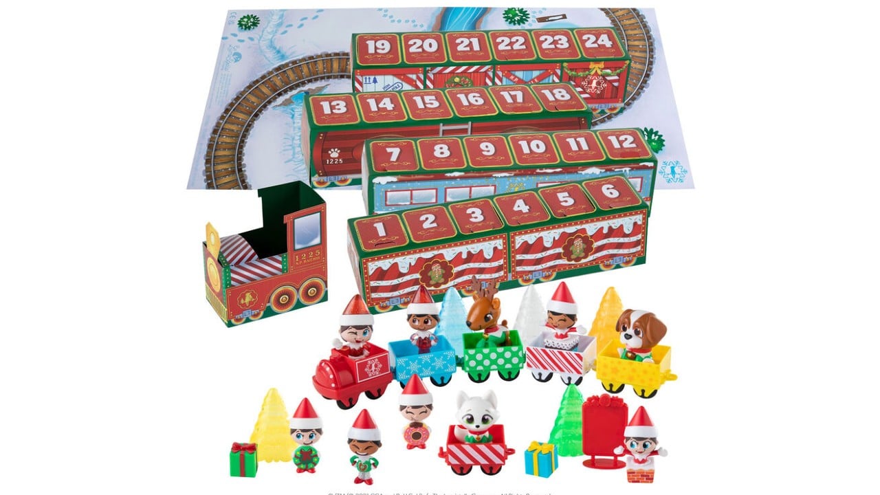 caja en forma de tren con juguetes de tren dentro